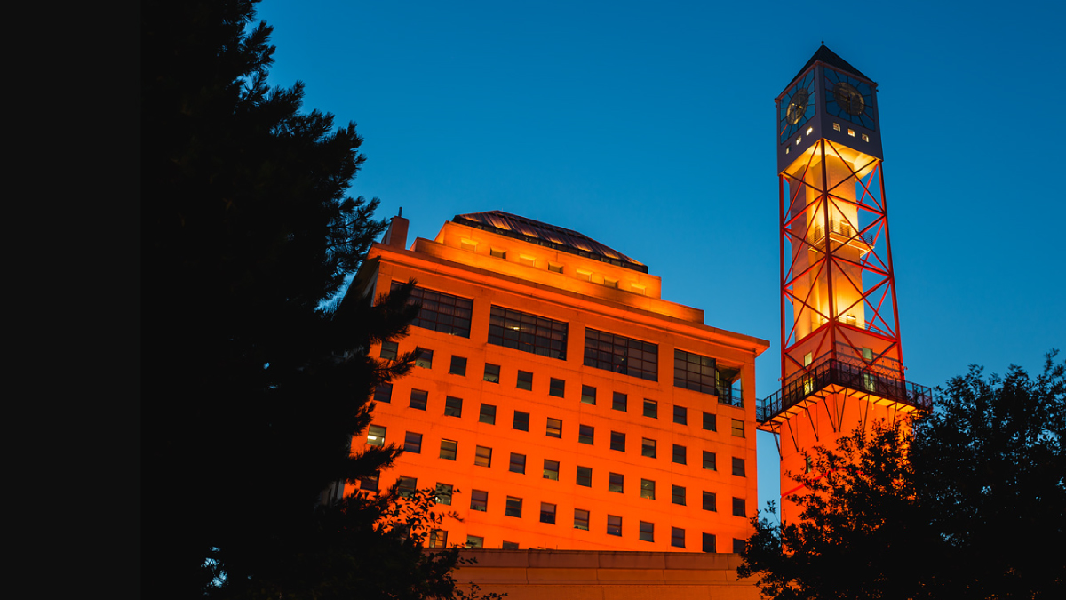The Civic Centre clock tower lit up orange.