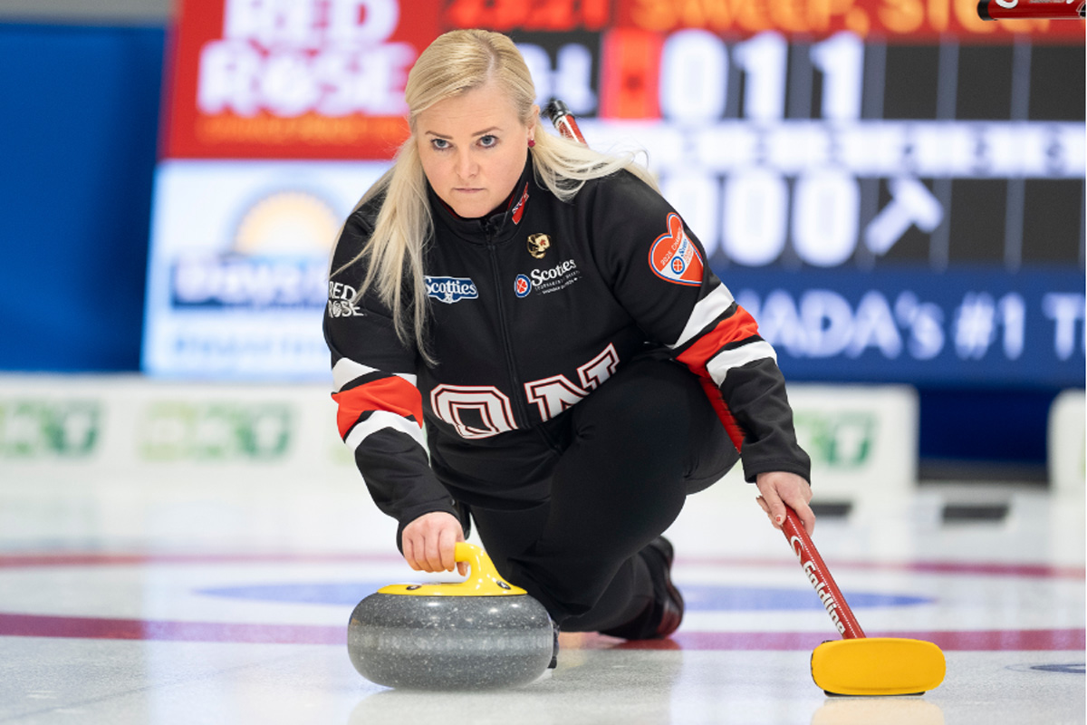 A curler throwing a curling stone