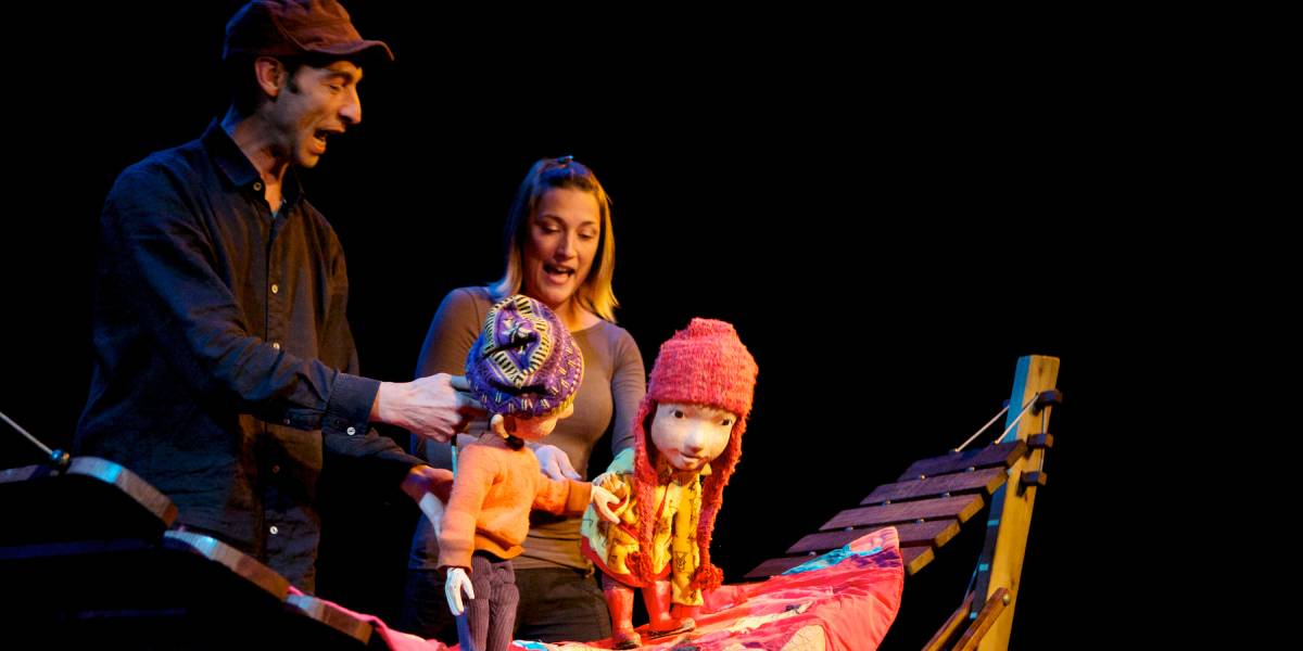 Performers at a puppet show