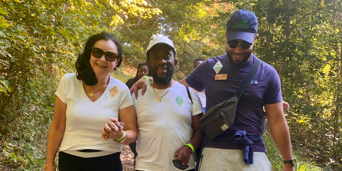 A group of people hiking on a trail