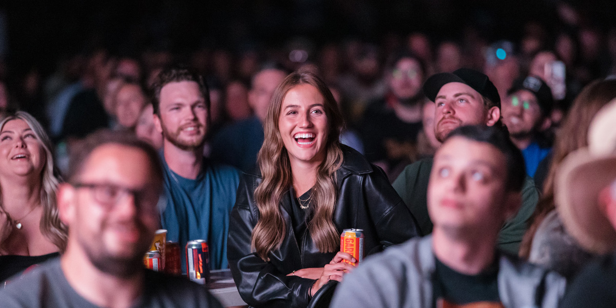 The audience at an outdoor comedy festival