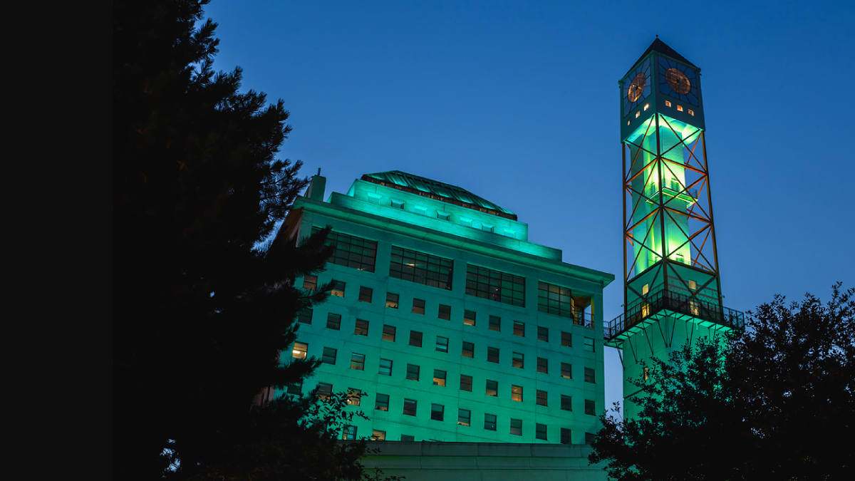 The Civic Centre clock tower lit teal.