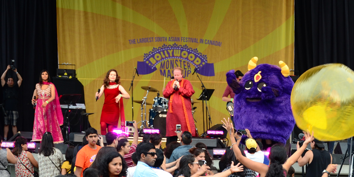 A group of performers on the Celebration Square stage.