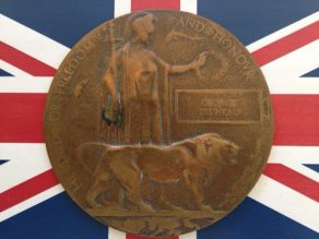  image of Britannia holding a trident and standing with a lion