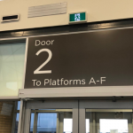 Large sign above door that reads Door 2 To Platforms A-F