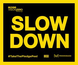 Slow down in yellow text on a black background