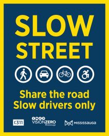 Slow Streets program signage. Share the road. Slow drivers only.
