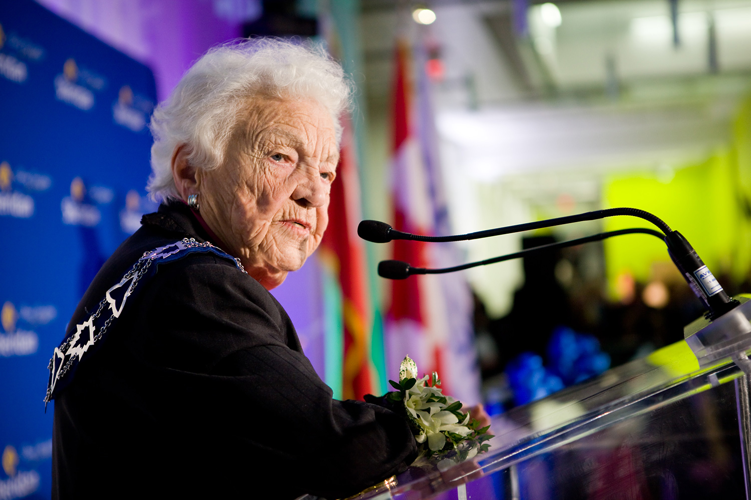 Hazel McCallion, former Mississauga Mayor, standing at a podium while delivering a speech.