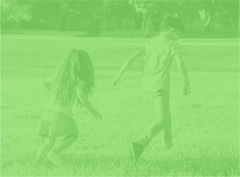 Two children running in a park with a green tint overlaid.