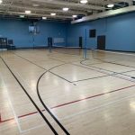 Tennis nets in a gymnasium