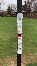 Fishing line collection tube on a pole in a local park