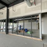 The interior of a fitness studio that is under construction.