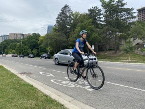 Person riding bike on bike lane in Mississauga.