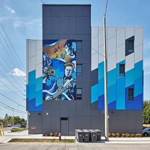 A building on Lakeshore in Mississauga that has blue and white art work on the sides.