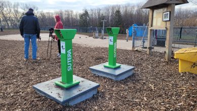 Two dog waste containers in leash-free zone in Mississauga