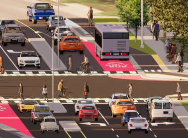 Artist rendering showing all lanes: bus pull over lane, separated bike lanes, turning lanes, pedestrians and and cyclists all using the space