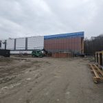 Glazing being installed on the exterior wall of the Aquatic Centre at the Carmen Corbasson Community Centre