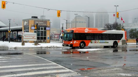 A bus driving through an intersection. Click image to see full screen.