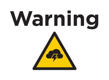 A warning sign with a storm symbol.