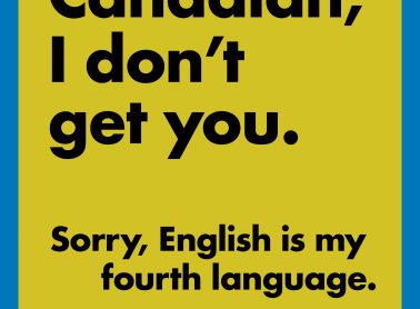 A yellow poster that says "Speak Canadian, I don't get you." "Sorry, English is my fourth language."