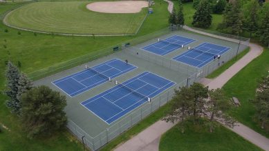 Aerial shot of four tennis courts