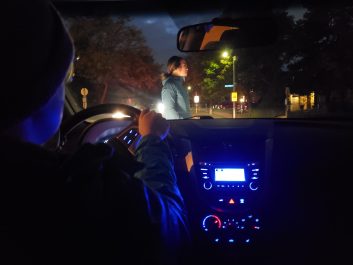 A person driving at night