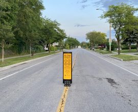 traffic bollards installed in the middle of a street