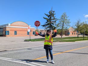 School crossing guard holding a stop sign