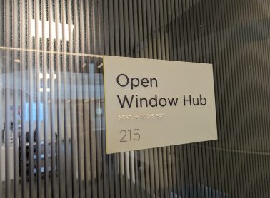 Door with sign Open Window Hub.