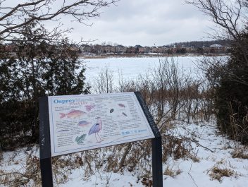 Full screen view of a sign from Osprey March in Winter