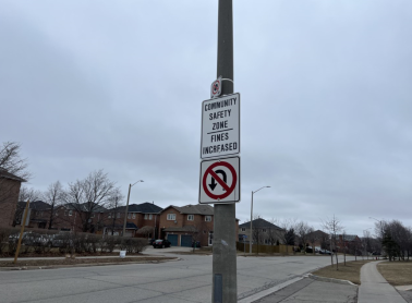 Community Safety Zone sign on a pole