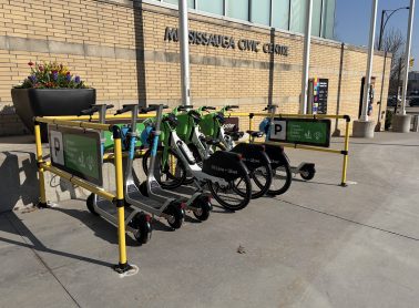 Parked e-scooters and e-bike