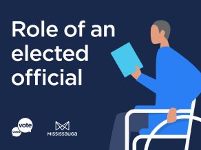 Man in a wheelchair with a ballot