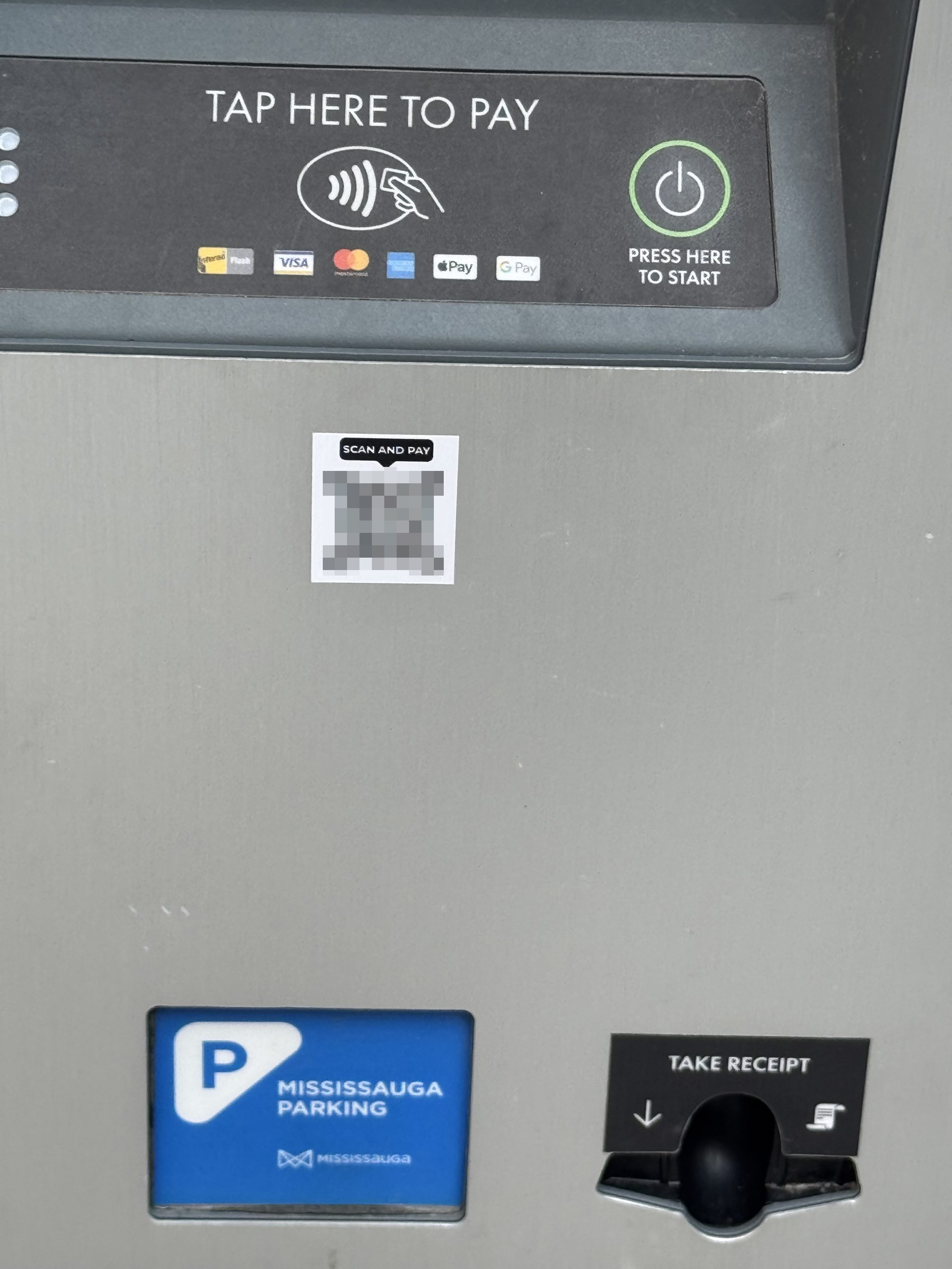 Blurred QR code on a City pay parking machine
