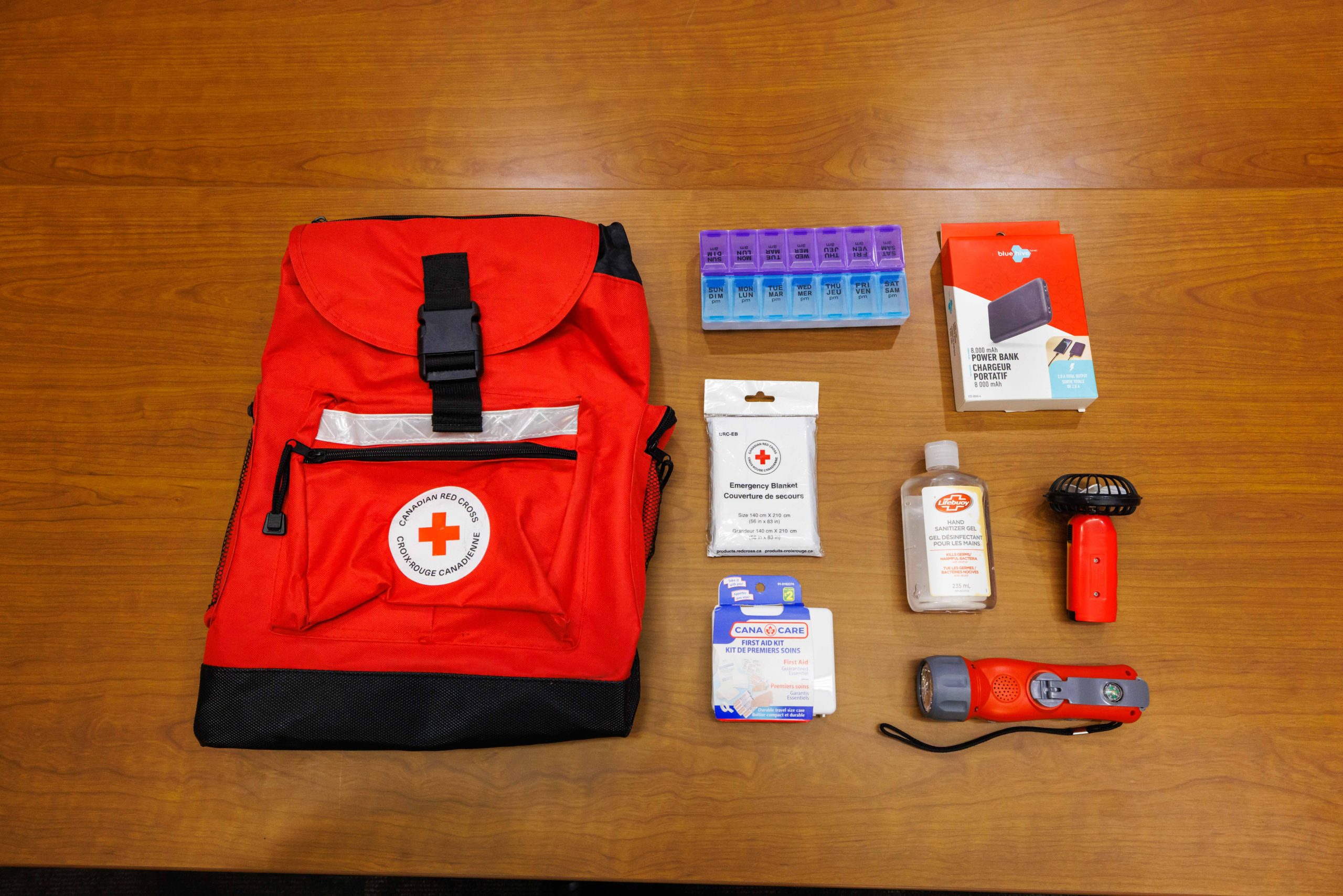 Items that can be included in an emergency kit like medication dosage, flashlight and hand sanitizer