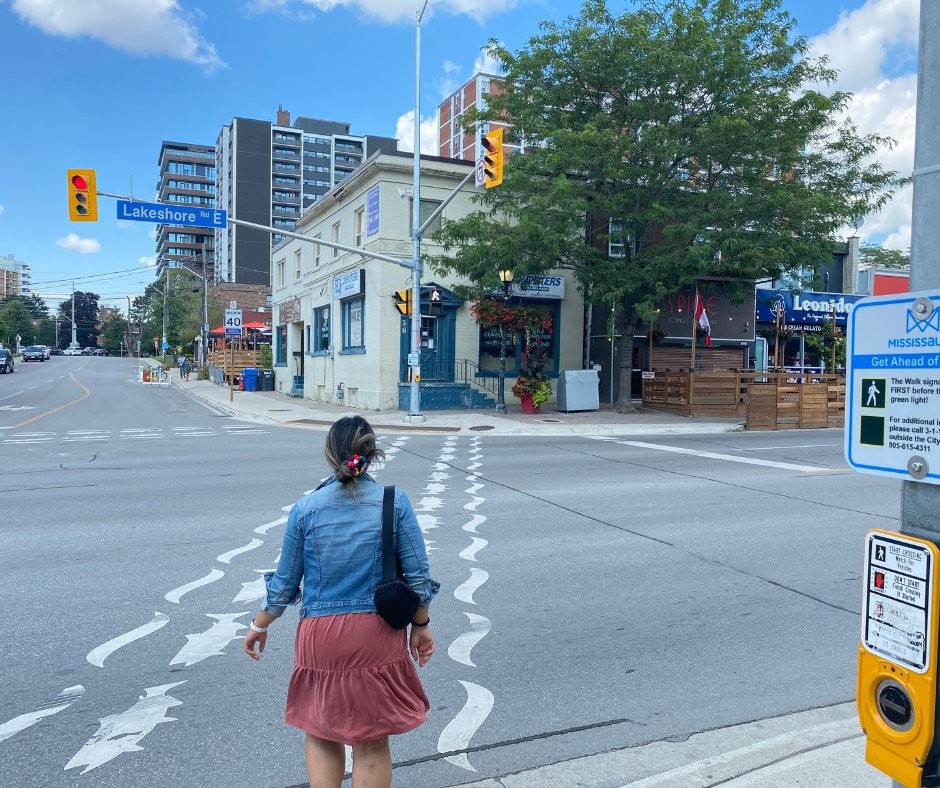 A pedestrian using the leading pedestrian interval crossing.