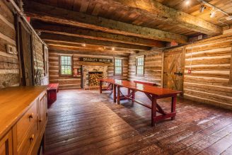 Interior view of the Log Cabin at Bradley Museum. 