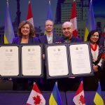 Mayor Carolyn Parrish of Mississauga and Mayor Serhiy Nadal of Ternopil along with Members of Council and special quests hold the signed Declarations of Cooperation and Twinning