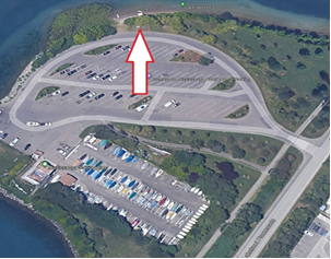Aerial view of Lakeview Promenade Park with an arrow showing where the lease for water-activity providers is for