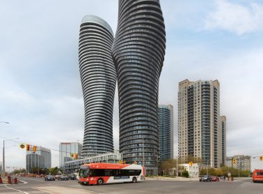 Photo of bus passing condo towers in Mississauga