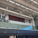 Wall graphic that reads "road to the six starts here, Raptors 905" inside the gymnasium at the Mississauga Sports and Entertainment Centre Sportsplex.
