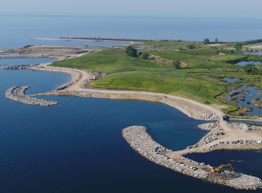 Offshore breakwater islands help protect and shape the restored shoreline at Jim Tovey Lakeview Conservation Area.