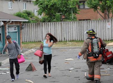 People evacuating from Hickory Drive
