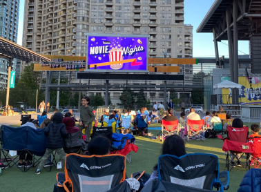 Wide-view shot of movie nights at celebration square.