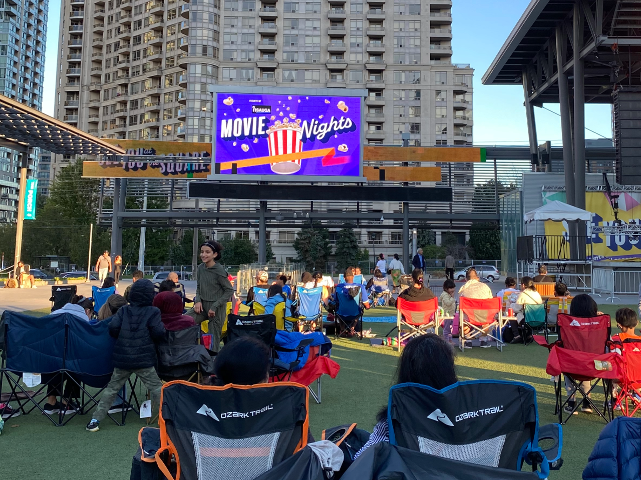Wide-view shot of movie nights at celebration square.