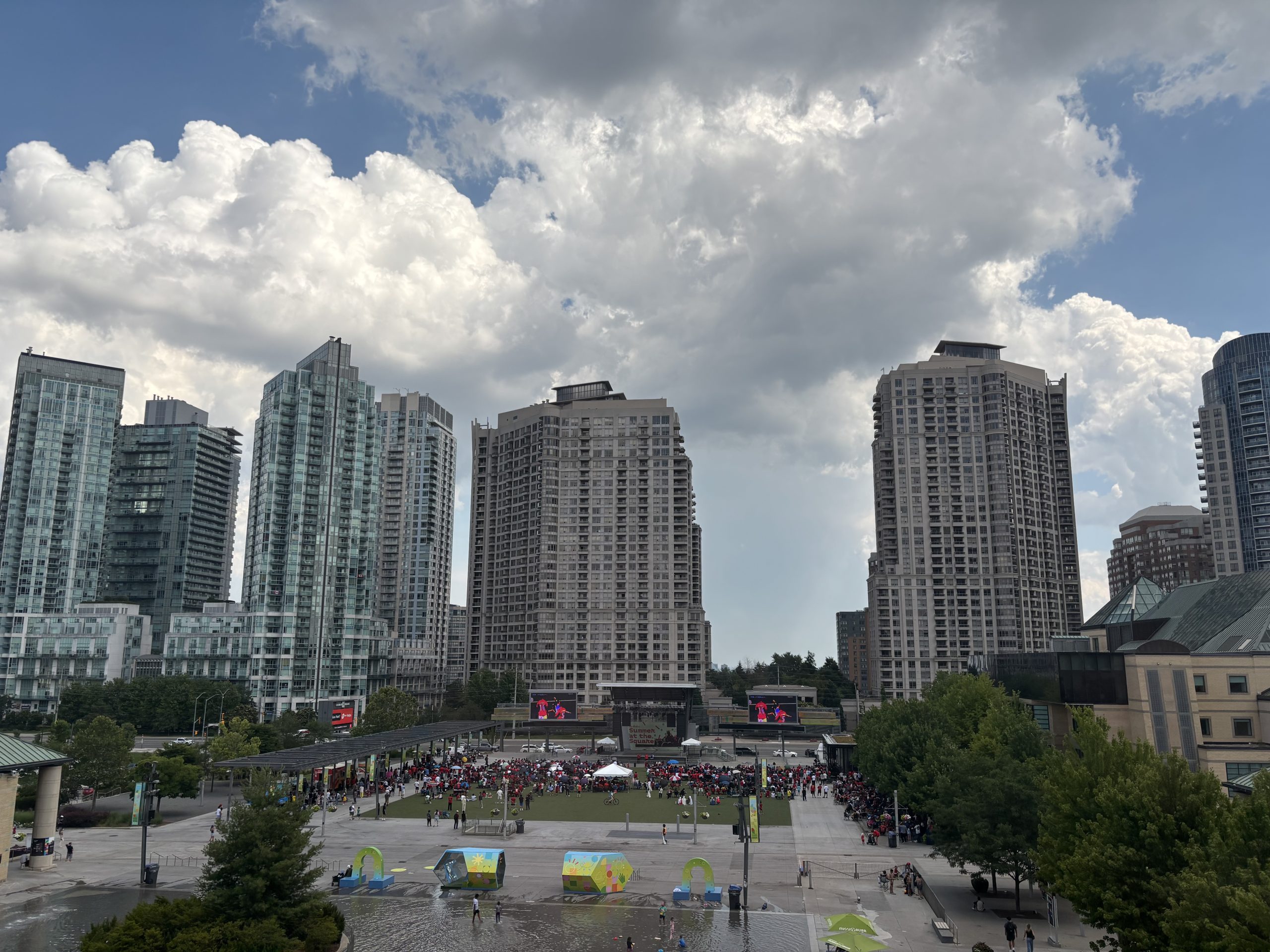 Buildings surrounded by clouds