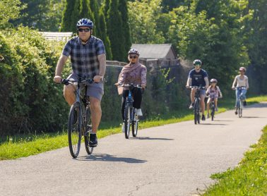People cycling on a cycle path.