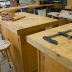 Individual wood working stations with tools.