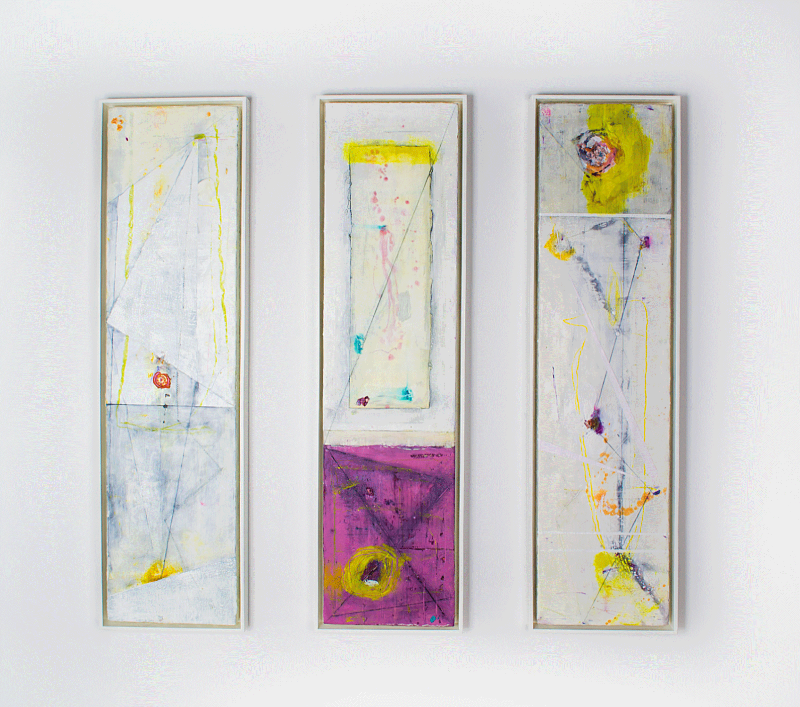 Three rectangular panels covered in colourful paint.