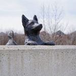 Metal sculpture depicting a dog